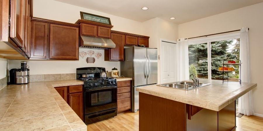 tan ceramic tile kitchen countertops in modern kitchen update