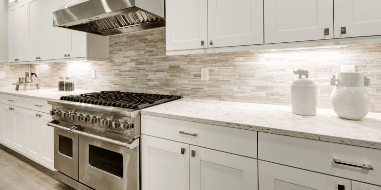 Stock Image of Kitchen with Cream Colored Cabinets