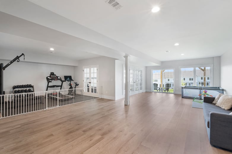 Secondary Suite and Gym in Remodeled Basement of New Jersey Home