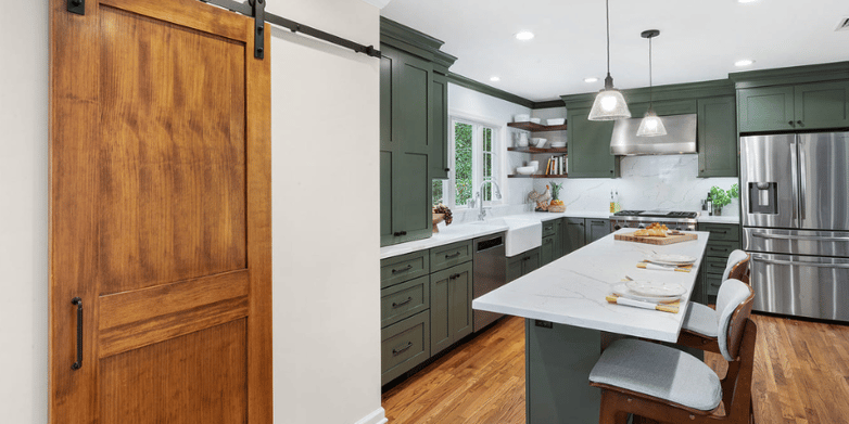 remodeled kitchen in new jersey by JMC with green cabinets