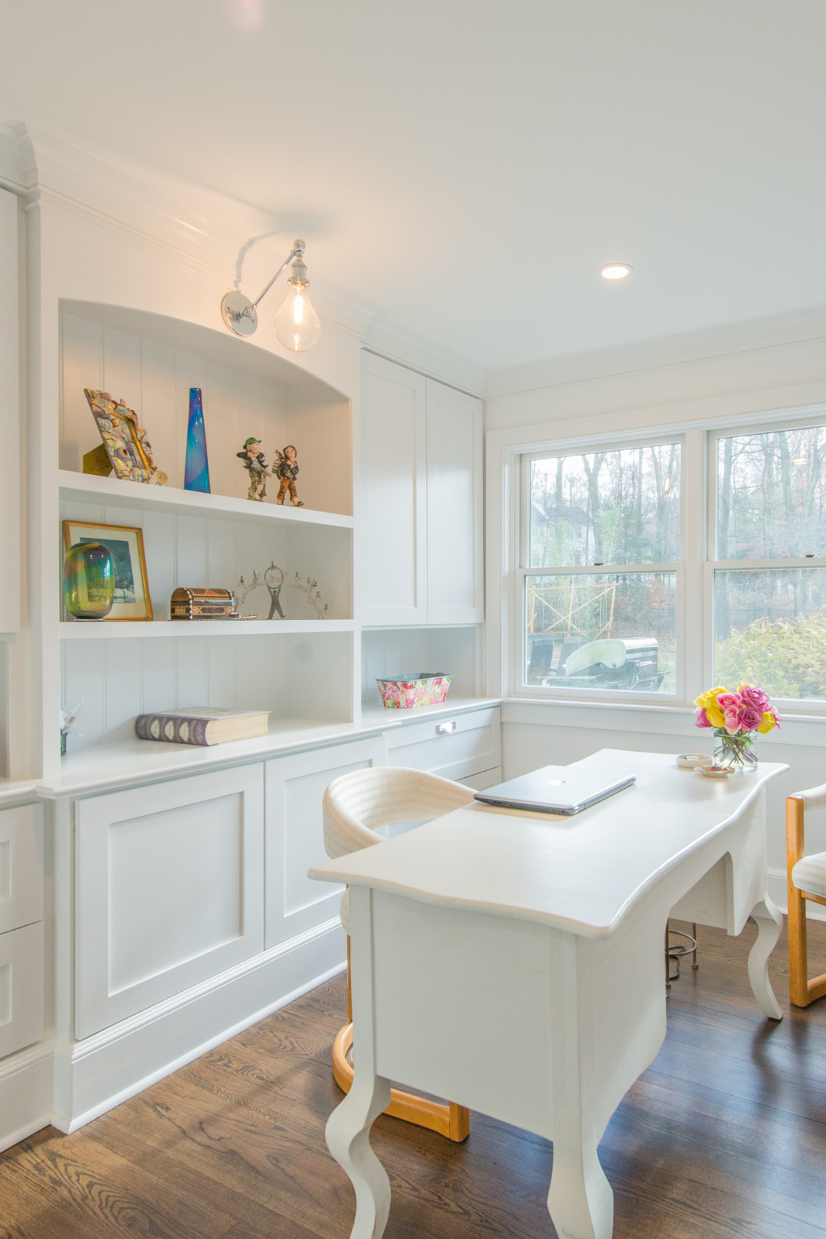 Spacious white office perfect for focus and completing work.