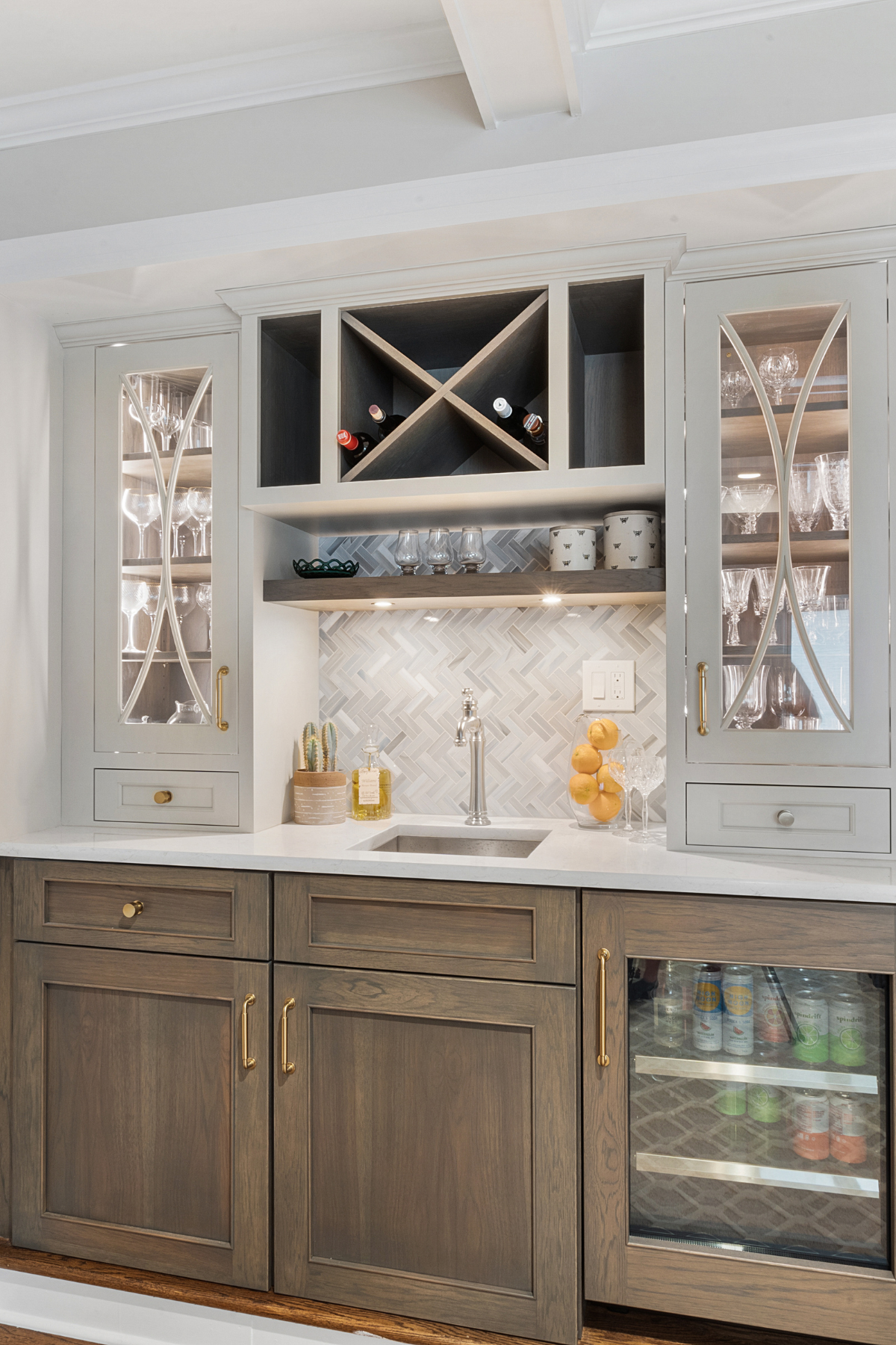 Custom wet bar with built-in shelving, stylish cabinetry, and modern fixtures, designed for both function and entertaining. Custom wet bar with built-in shelving, stylish cabinetry, and modern fixtures, designed for both function and entertaining.