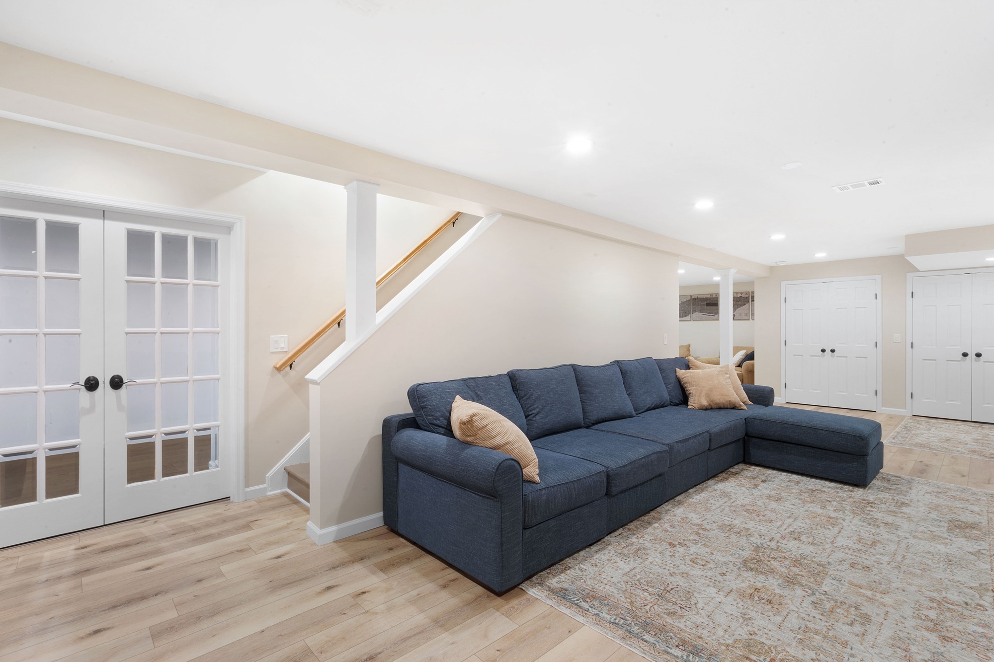 Stairs to Finished Basement with Gym Room