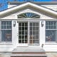 Exterior Sunroom with French doors and arch window in Morris County, New Jersey renovated by JMC Home Improvement Specialists