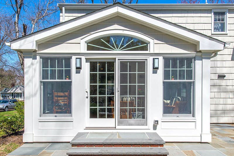 Exterior Sunroom with French doors and arch window in Morris County, New Jersey renovated by JMC Home Improvement Specialists