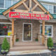 Store Front Enterance with Wood Beams and Metal Roof  Renovated by JMC Home Improvement Specialists