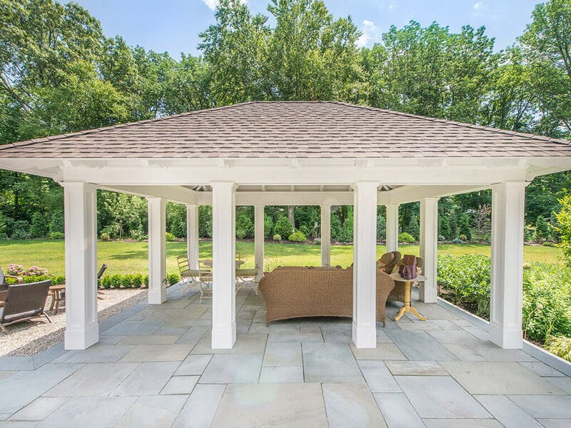 Blue stone patio with pavilion with custom traditional paneled columns in Boonton, NJ renovated by JMC Home Improvement Specialists