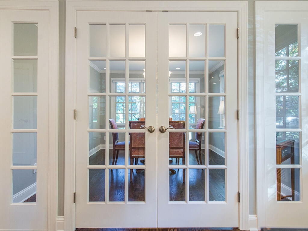 Glass panel French door entrance to dining room with side transoms in Springfield, NJ renovated by JMC Home Improvement Specialists