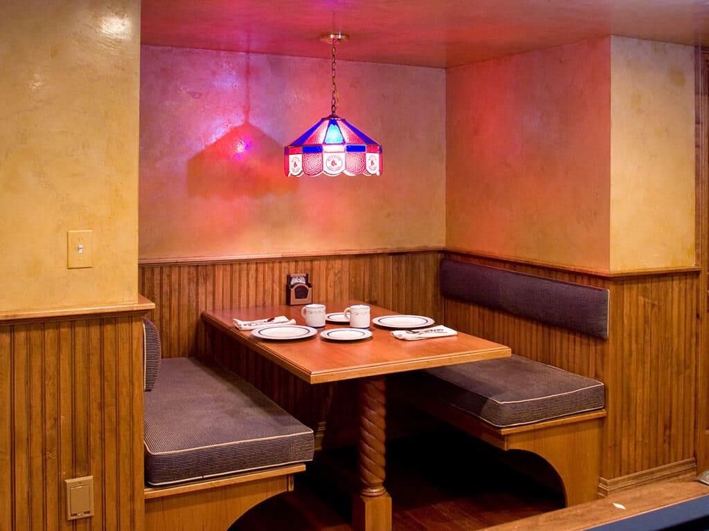 Basement remodel with custom built-in bench diner style in Randolph New Jersey Renovated by JMC Home Improvement Specialists