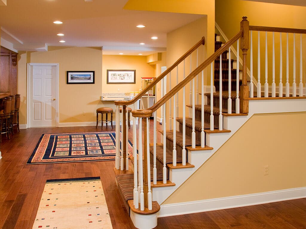 Basement remodel wood railings staircase in Randolph New Jersey Renovated by JMC Home Improvement Specialists