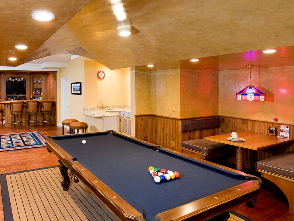 Award Winning Custom basement with pool table and arch ceiling with custom paint in Randolph New Jersey Renovated by JMC Home Improvement Specialists