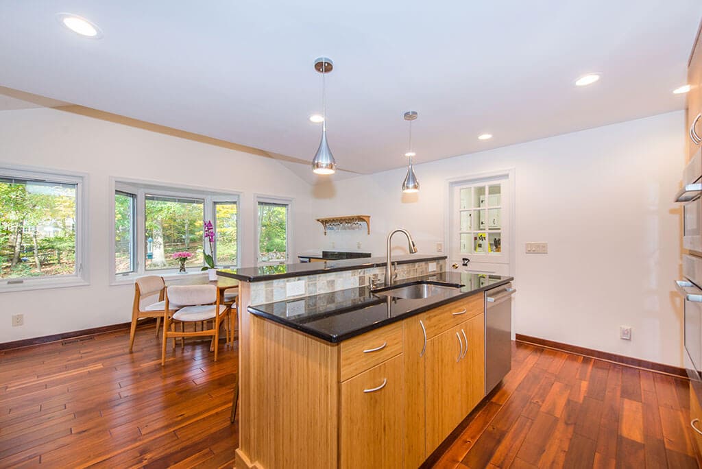 Modern bamboo eat-in kitchen remodel with granite counters, undermount sink inRandolph, NJ renovated by JMC Home Improvement Specialists