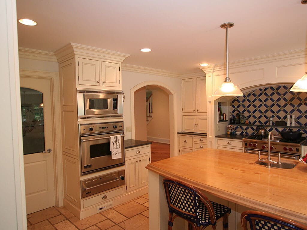 Traditionally Styled Off-White Kitchen in Mt. Lakes