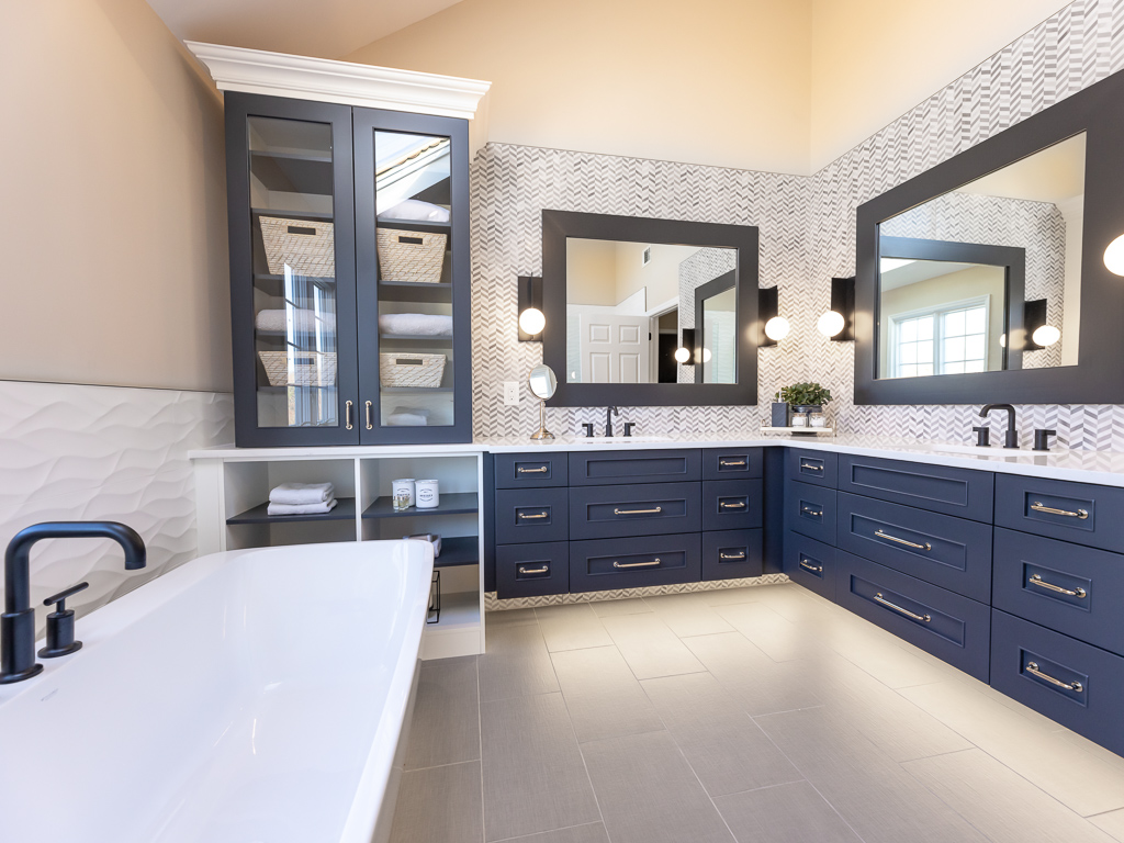 Modern Master Bath with Soaking Tub  and Storage blue cabinets bathroom remodel renovated by JMC Home Improvement Specialists