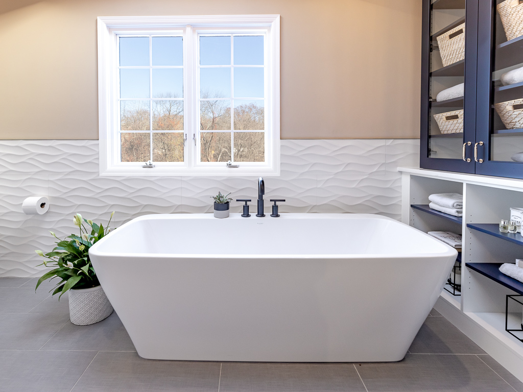 Modern Master Bath with Soaking Tub  and Storage blue cabinets bathroom remodel renovated by JMC Home Improvement Specialists