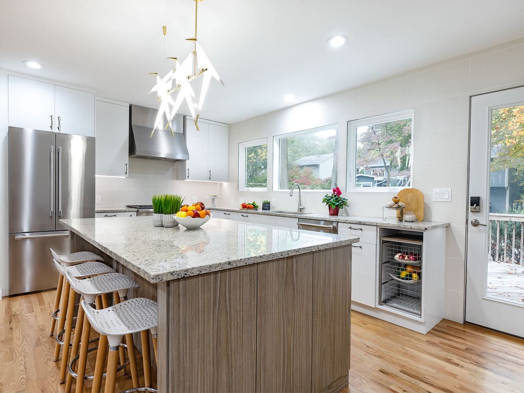 Kitchen Remodel with bird chandelier, twig branch cabinet drawer pulls, leaf handles with two tone accents in Livingston , NJ renovated by JMC Home Improvement Specialists