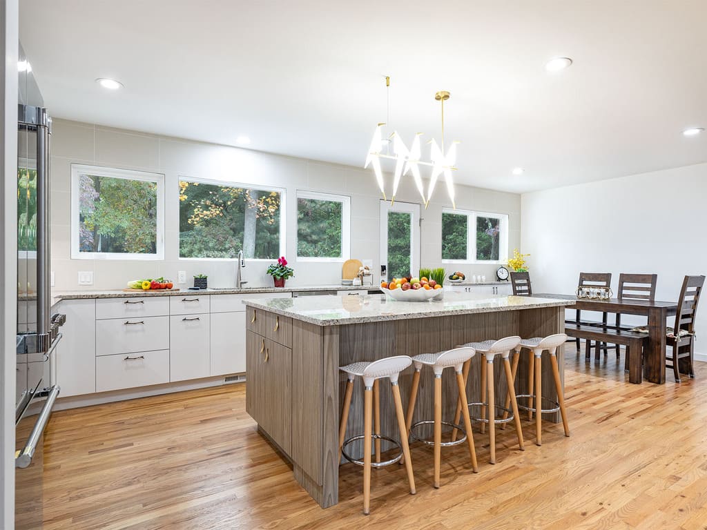 Kitchen Remodel with bird chandelier, twig branch cabinet drawer pulls, leaf handles with two tone accents in Livingston , NJ renovated by JMC Home Improvement Specialists