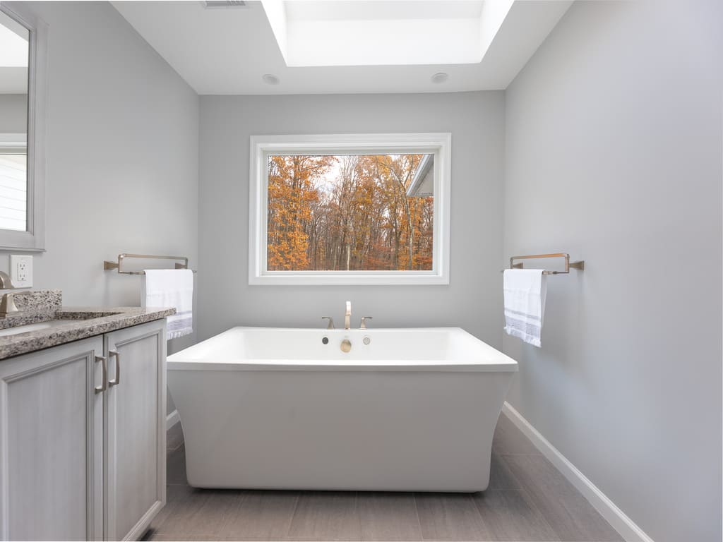 Master Bathroom remodel with soaking tub, walk in shower, double vanity and skylight in Randolph, NJ renovated by JMC Home Improvement Specialists
