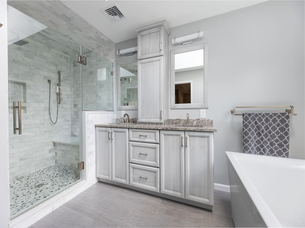 Master Bathroom remodel with soaking tub, walk in shower, double vanity and skylight in Randolph, NJ renovated by JMC Home Improvement Specialists