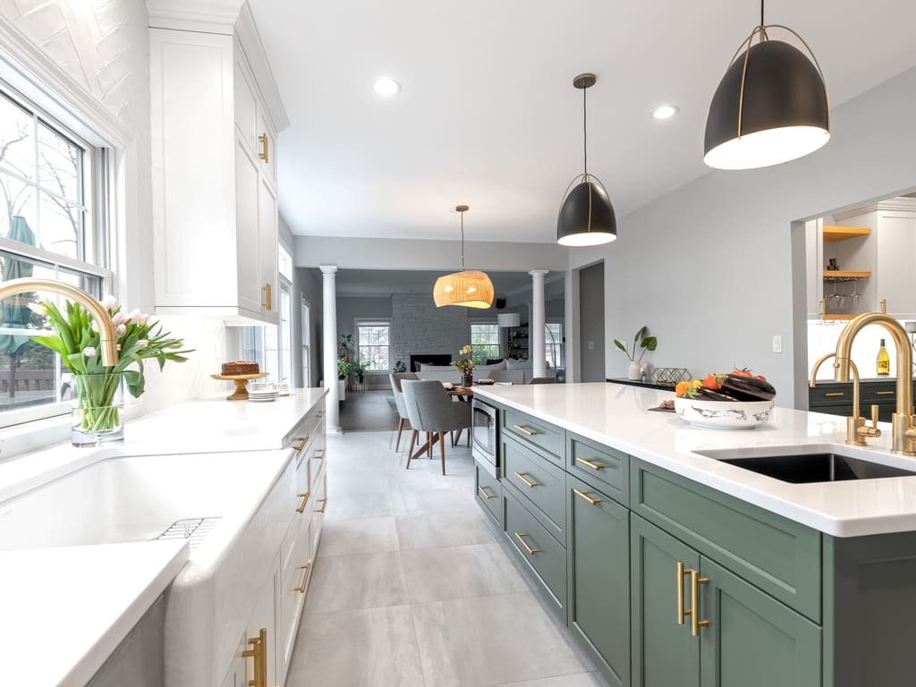 Two tone modern kitchen remodel with brushed gold accents in Towaco, NJ renovated by JMC Home Improvement Specialists