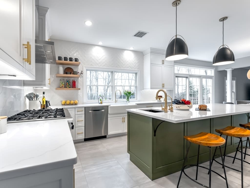 Two tone modern kitchen remodel with brushed gold accents in Towaco, NJ renovated by JMC Home Improvement Specialists