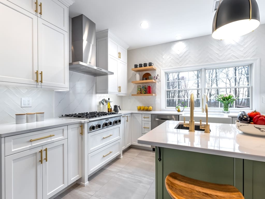 Two tone modern kitchen remodel with brushed gold accents in Towaco, NJ renovated by JMC Home Improvement Specialists