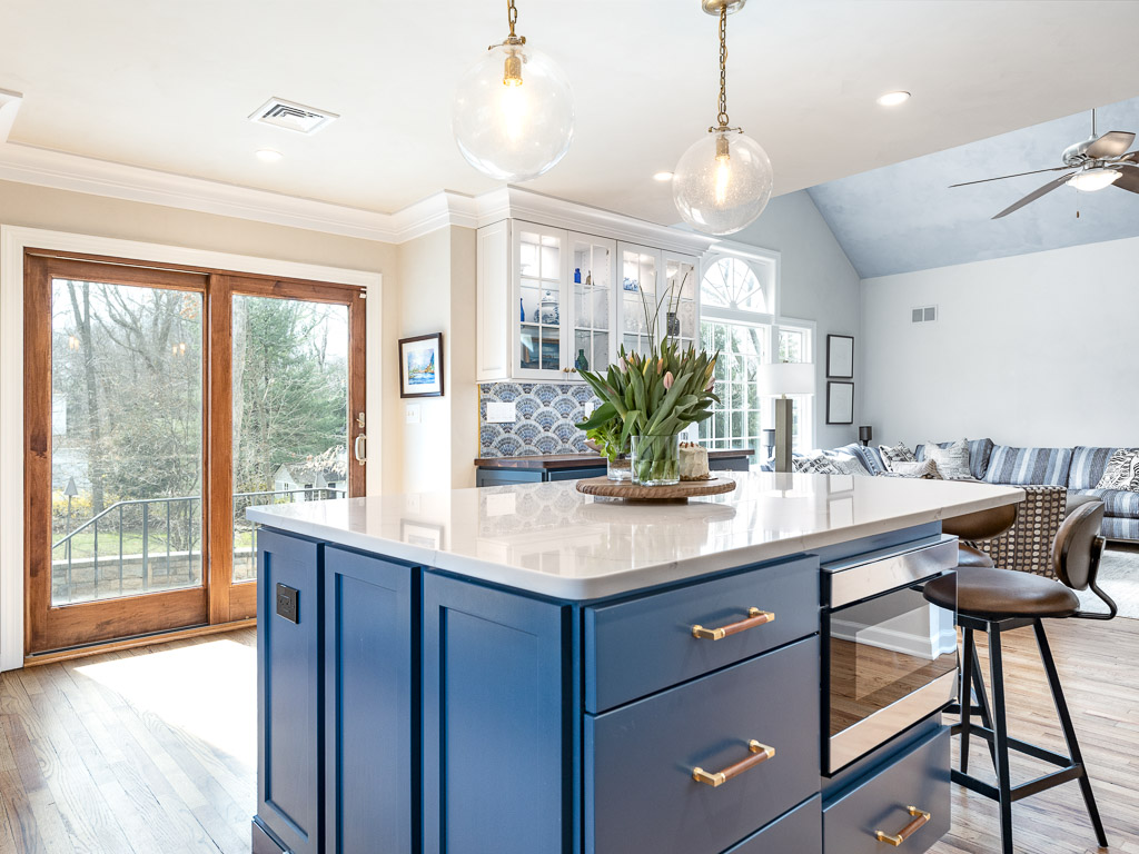 Chatham kitchen remodel with blue cabinets and custom tile backsplash