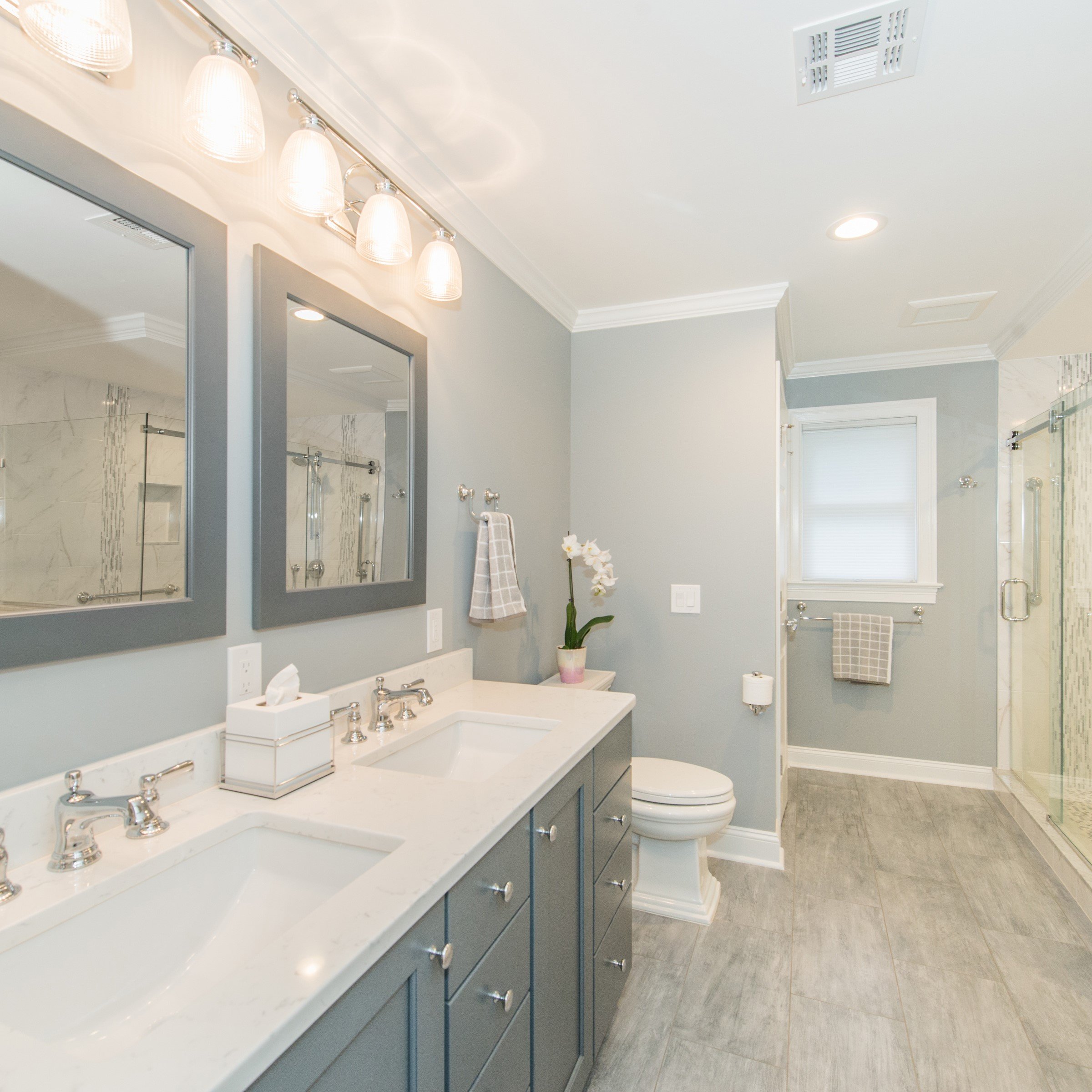 A Spacious Master with Large Marble Window in Shower & Hall Bath with Soaking Tub