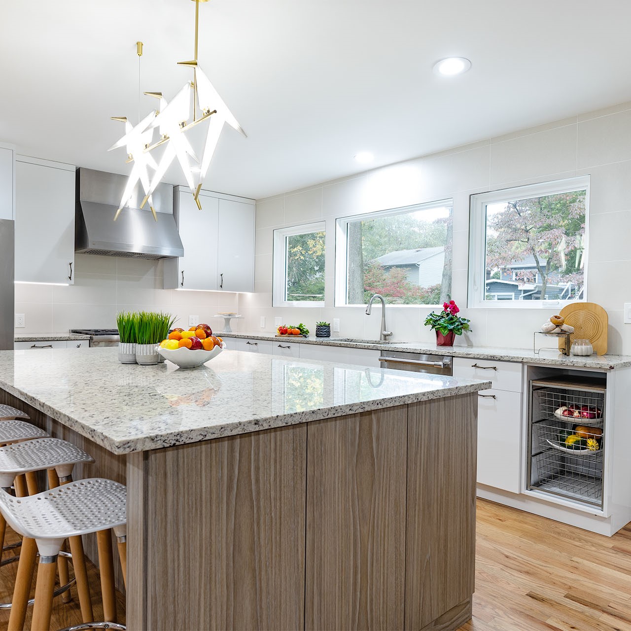 A Livingston Kitchen Remodel with Large Island and Bird Chandelier