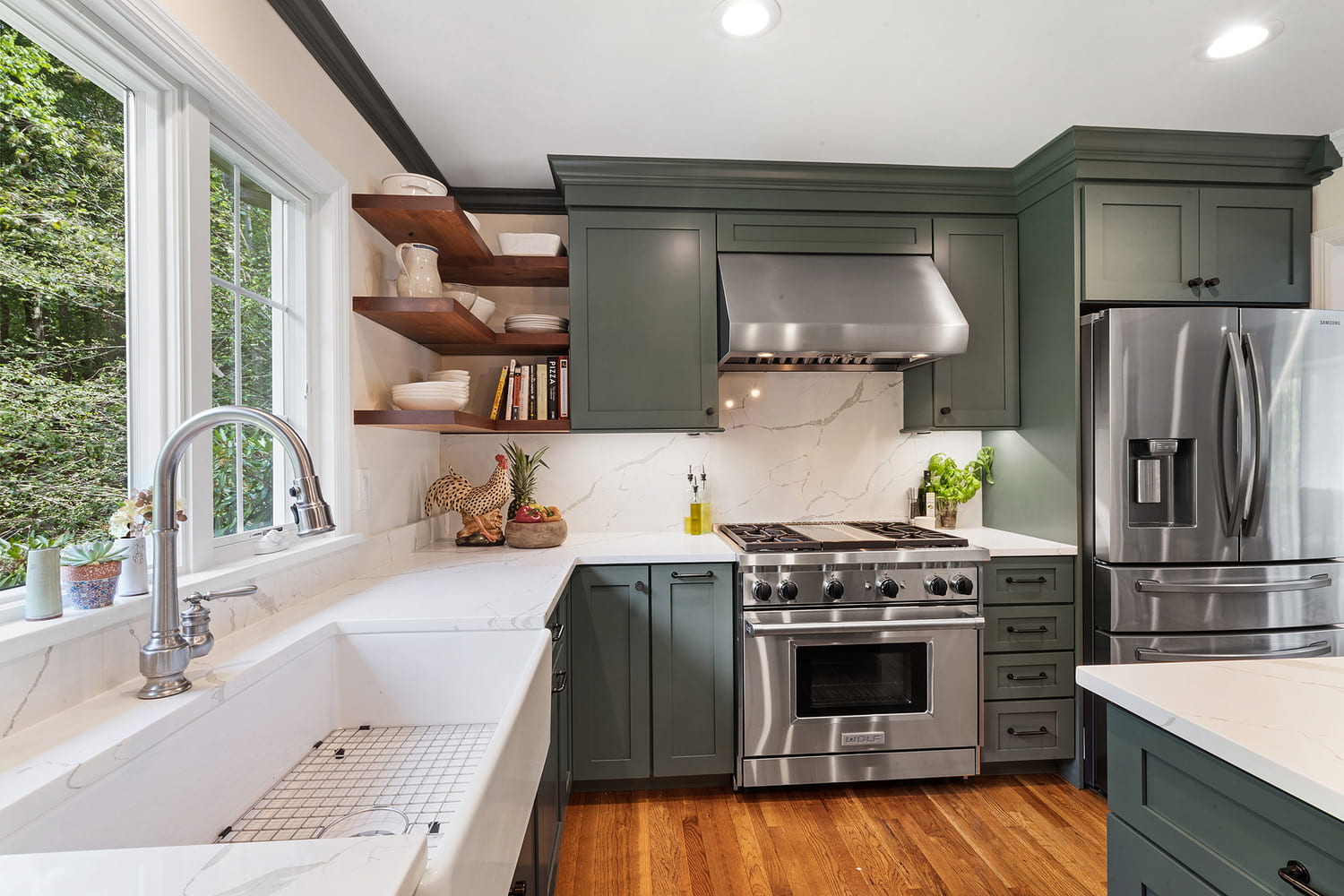Mendham farmhouse kitchen remodel with lily pad green shaker cabinet doors, quartz and butcher block with farmhouse sink and Anderson windows.