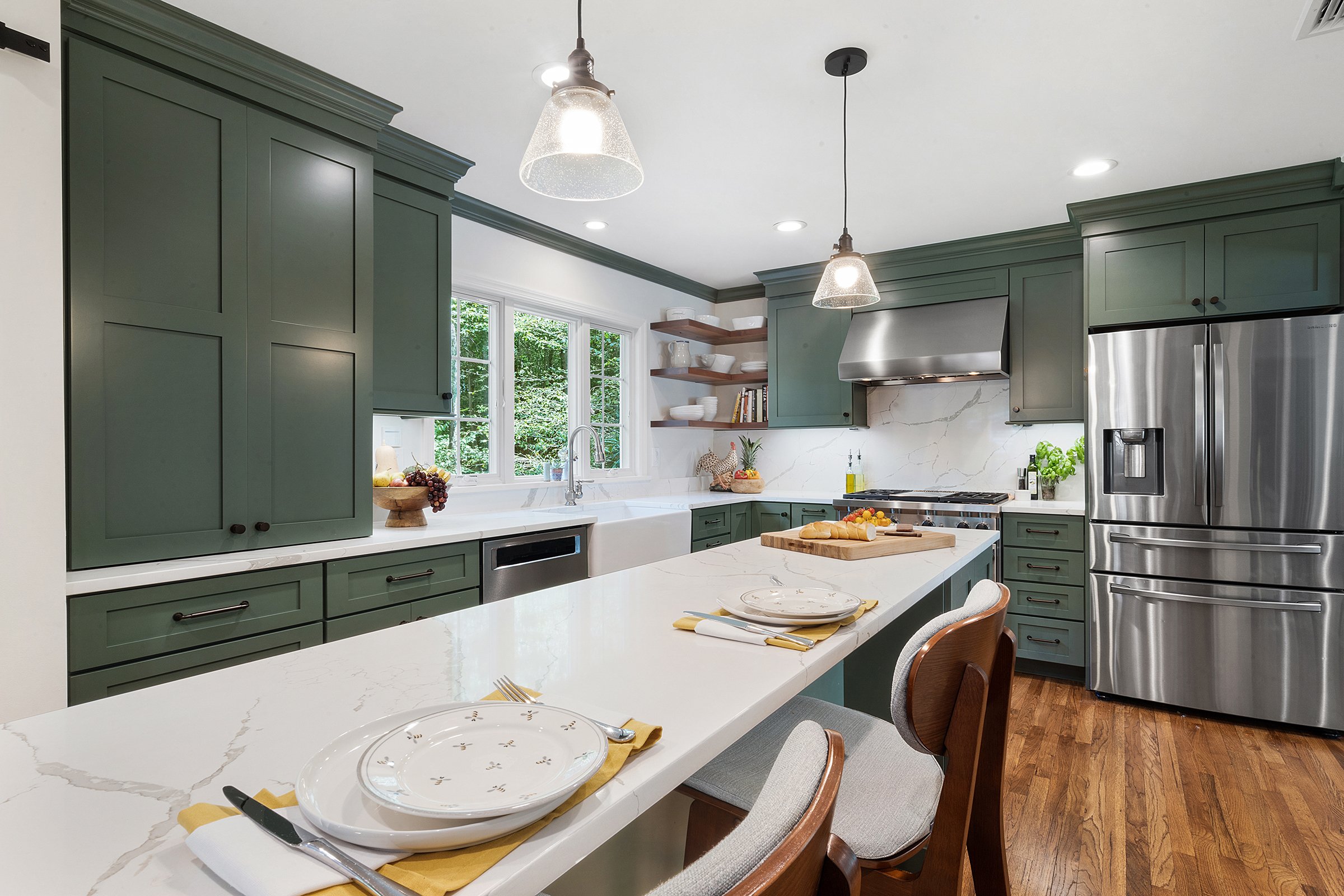 Mendham farmhouse kitchen remodel with lily pad green shaker cabinet doors, quartz and butcher block with farmhouse sink and Anderson windows.