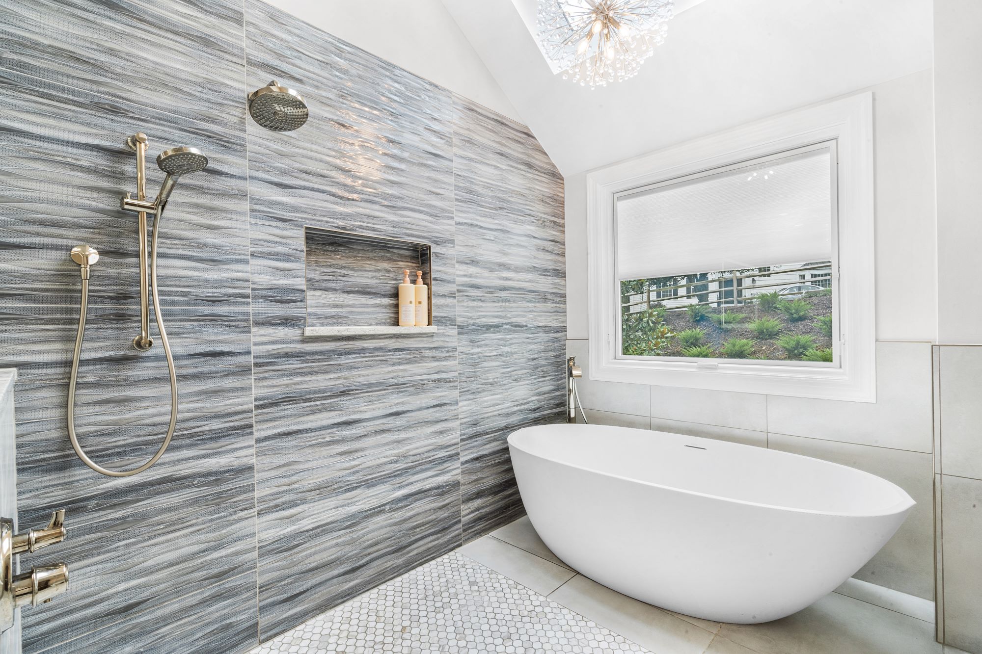 Bathroom remodel with soaking tub in shower with large windows and chandelier and lots of light in  North Caldwell, NJ