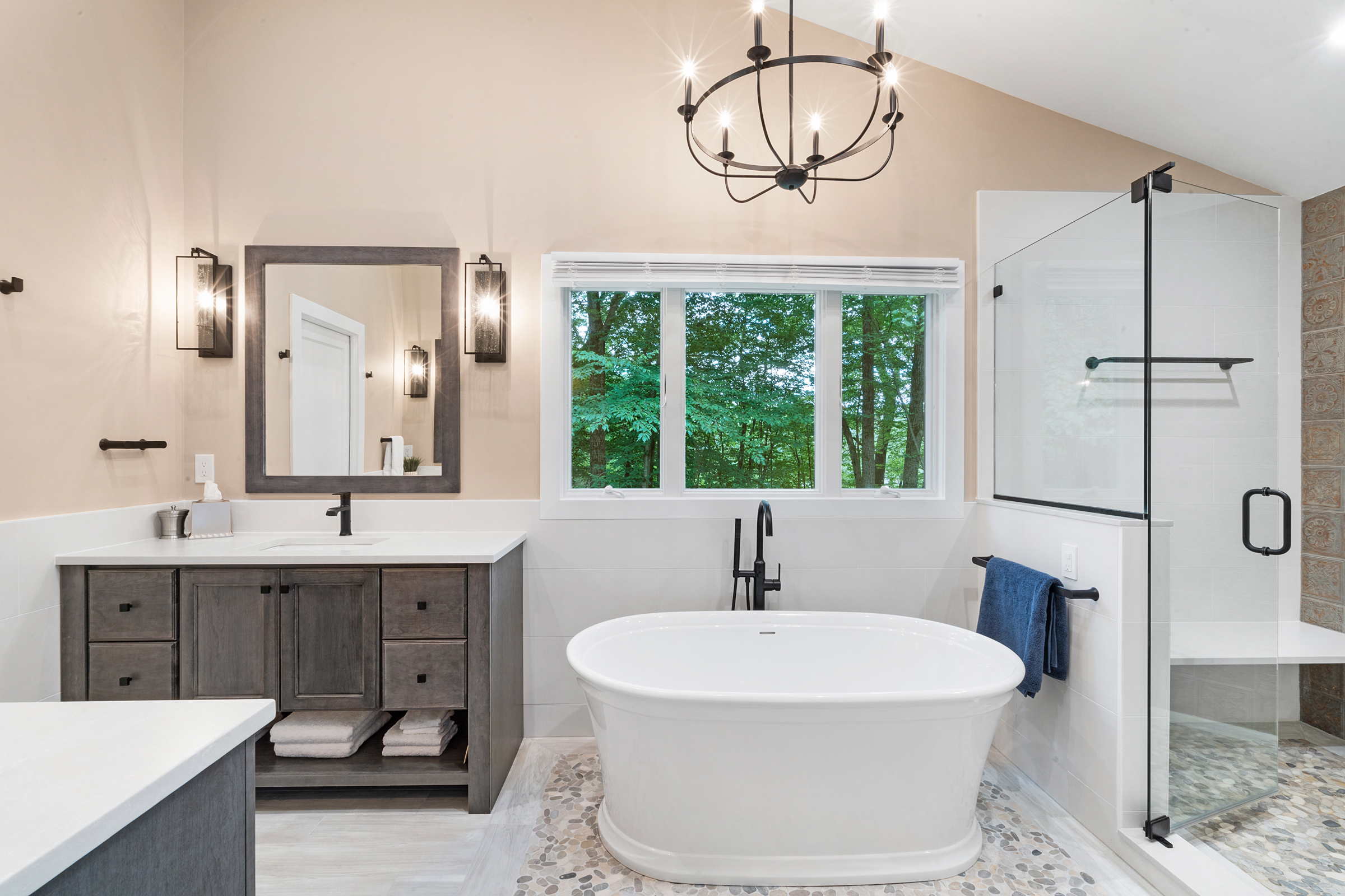 Master bathroom remodel soaking tub, wall paneling, walk in shower with cherry dusk shaker door legacy crafter cabinets, silestone desert silver suede countertops, kohler Santa rosa Toilet, black and white tile in Chester, NJ renovated by JMC Home Improvement Specialists