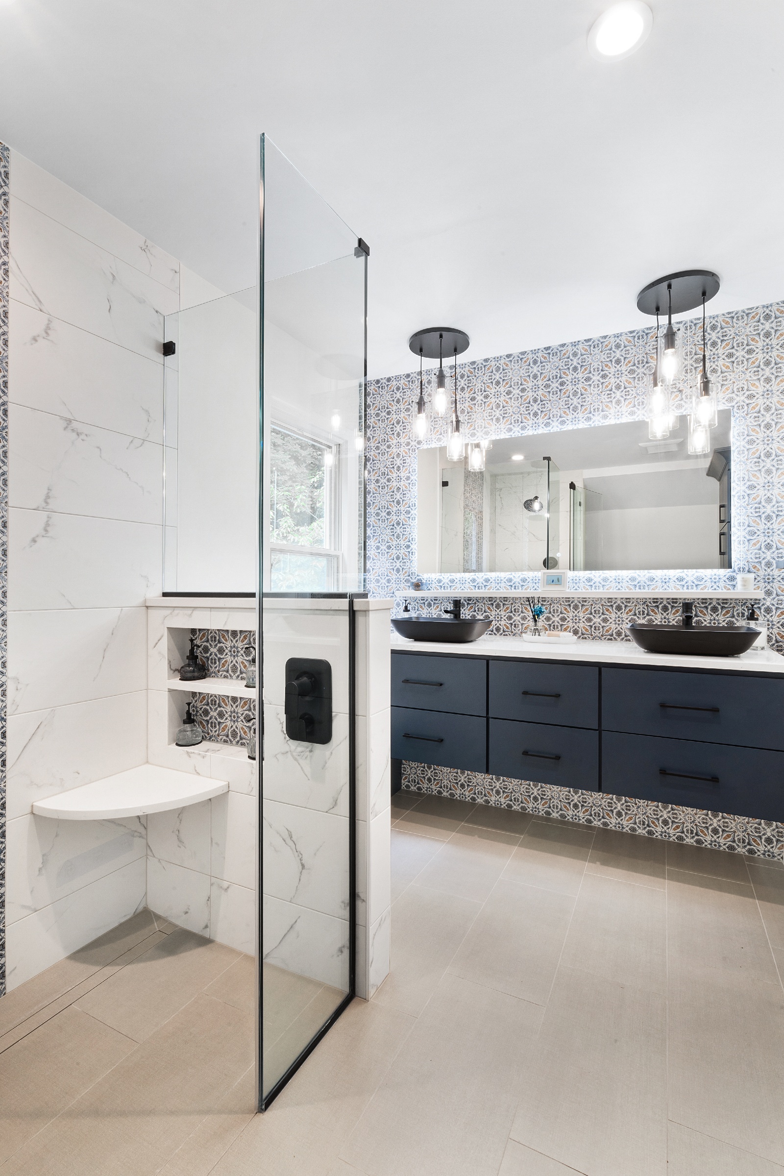 Master bathroom remodel with heated floors, 21x24 tiles and Moen fixtures in Flanders, NJ renovated by JMC Home Improvement Specialists