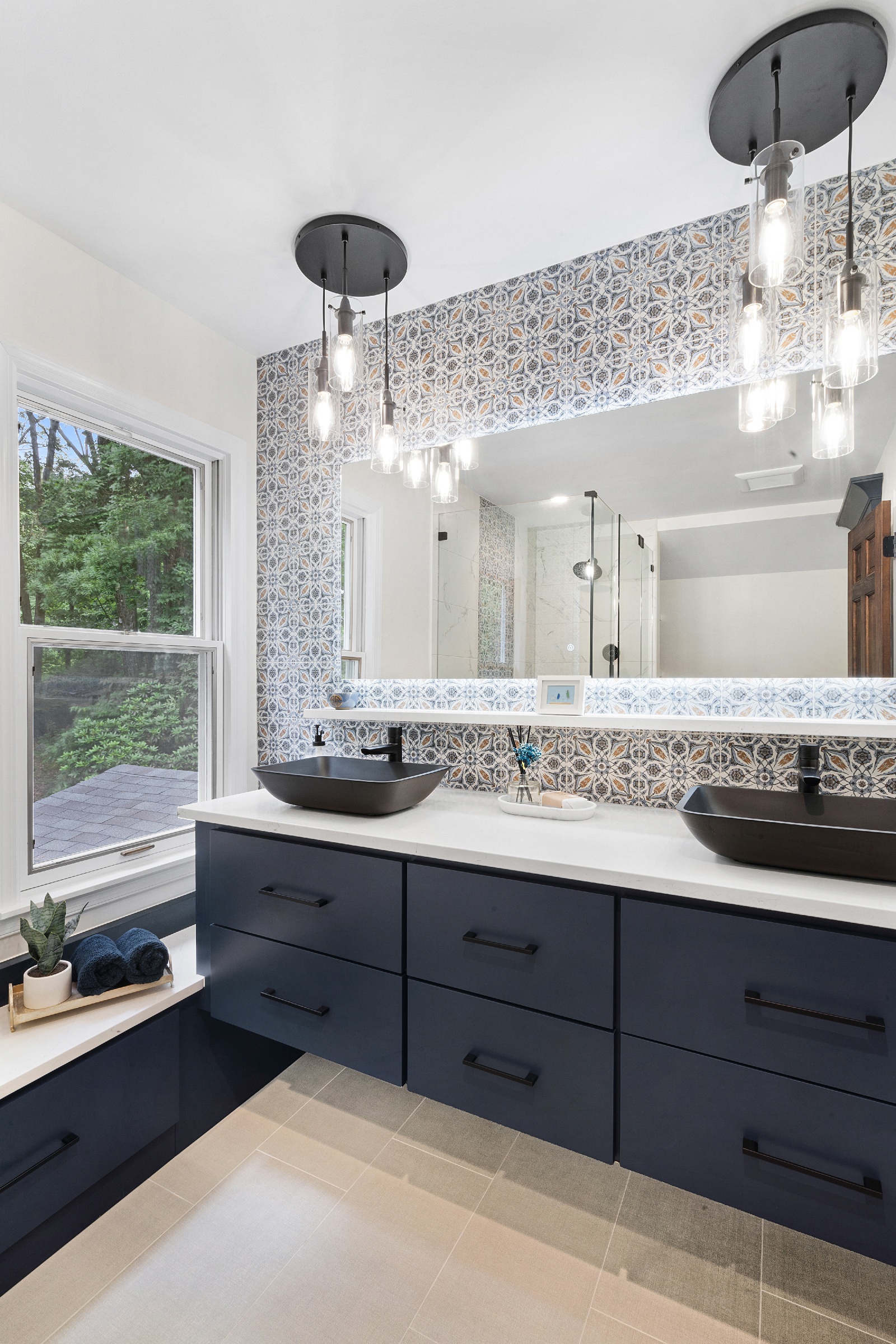 Master bathroom remodel with heated floors, 21x24 tiles and Moen fixtures in Flanders, NJ renovated by JMC Home Improvement Specialists