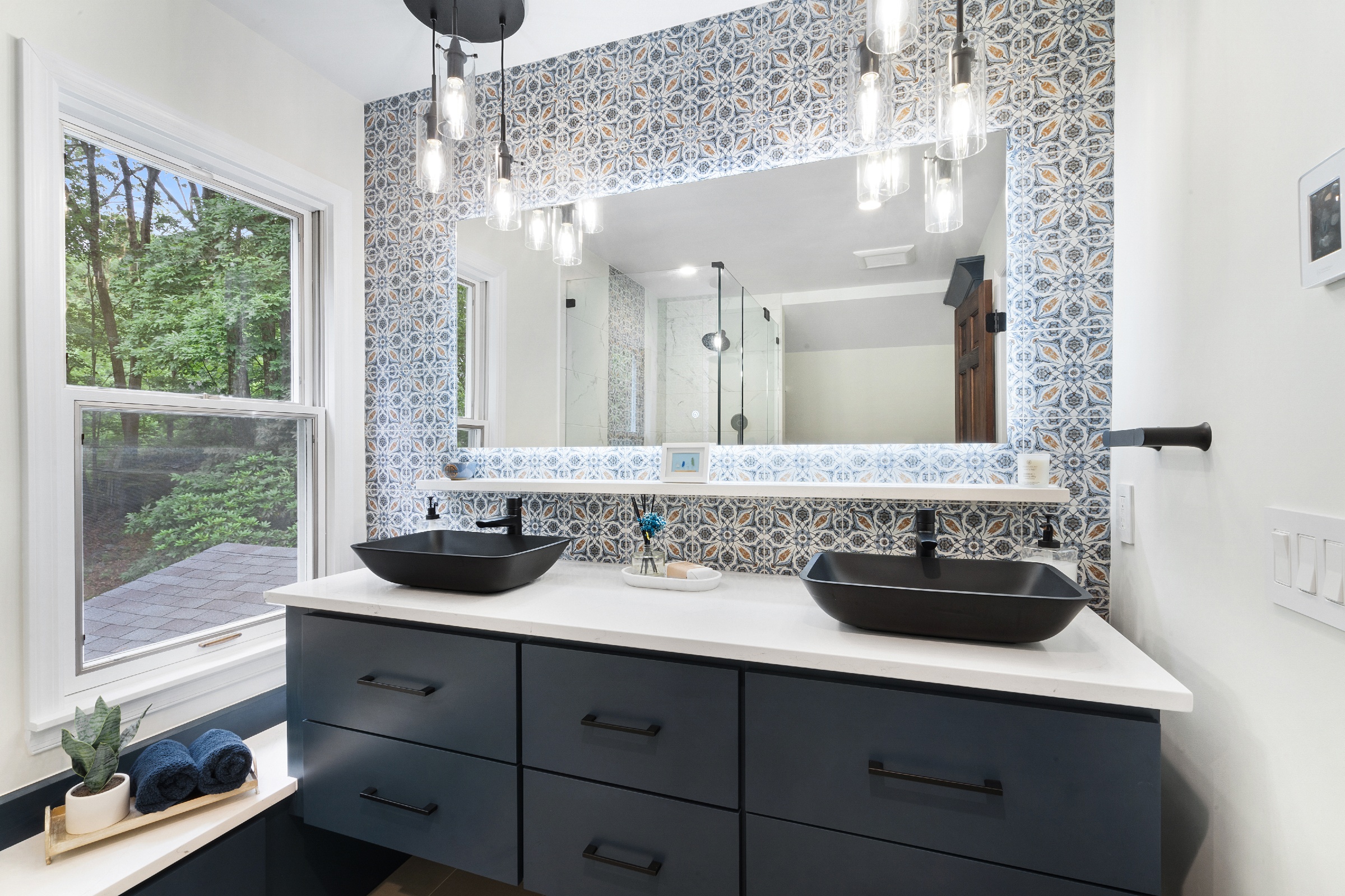 Master bathroom remodel with heated floors, 21x24 tiles and Moen fixtures in Flanders, NJ renovated by JMC Home Improvement Specialists