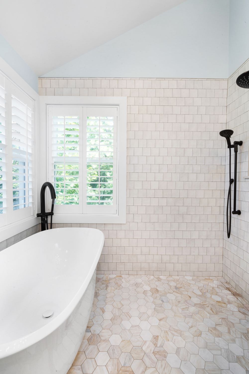 Bathroom remodel with soaking tub in shower with dual vanity in Whitehouse Station, New Jersey